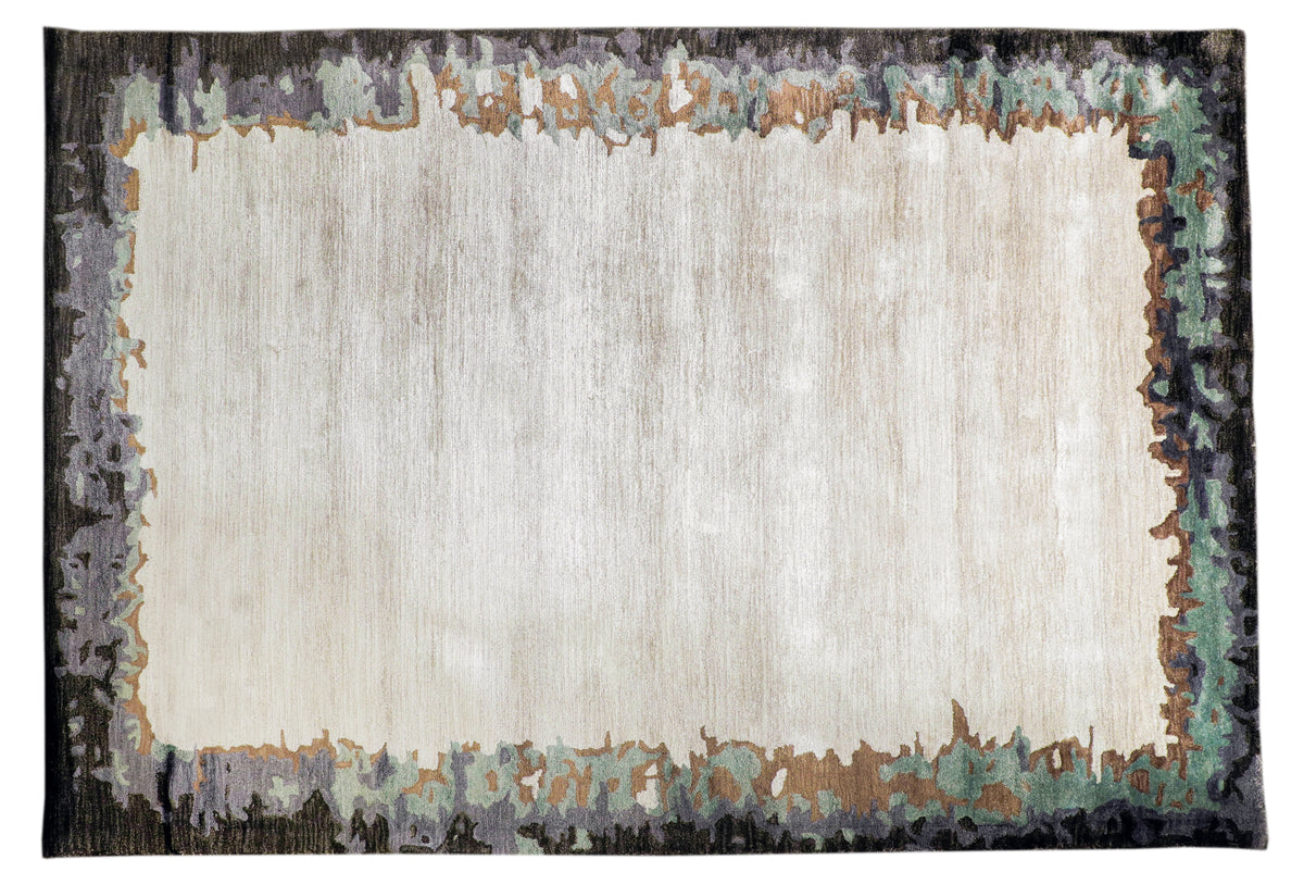 Handmade bamboo silk rug with abstract layered gold, green, and grey tones on a contemporary design.