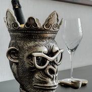 Chill Chimp silver ice bucket with sculptural monkey design, luxury home bar accessory for entertaining and modern home décor.