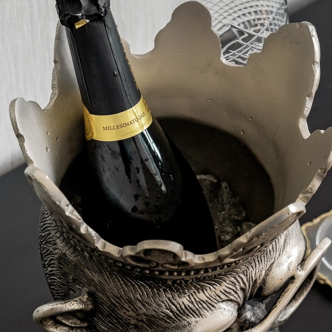 Chill Chimp silver ice bucket with sculptural monkey design, luxury home bar accessory for entertaining and modern home décor.