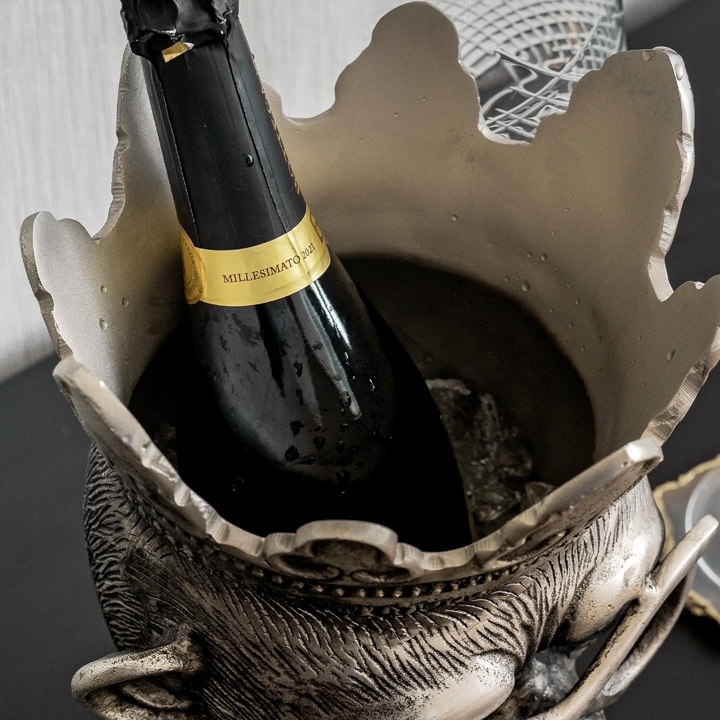 Chill Chimp silver ice bucket with sculptural monkey design, luxury home bar accessory for entertaining and modern home décor.