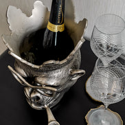 Chill Chimp silver ice bucket with sculptural monkey design, luxury home bar accessory for entertaining and modern home décor.