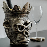 Chill Chimp silver ice bucket with sculptural monkey design, luxury home bar accessory for entertaining and modern home décor.