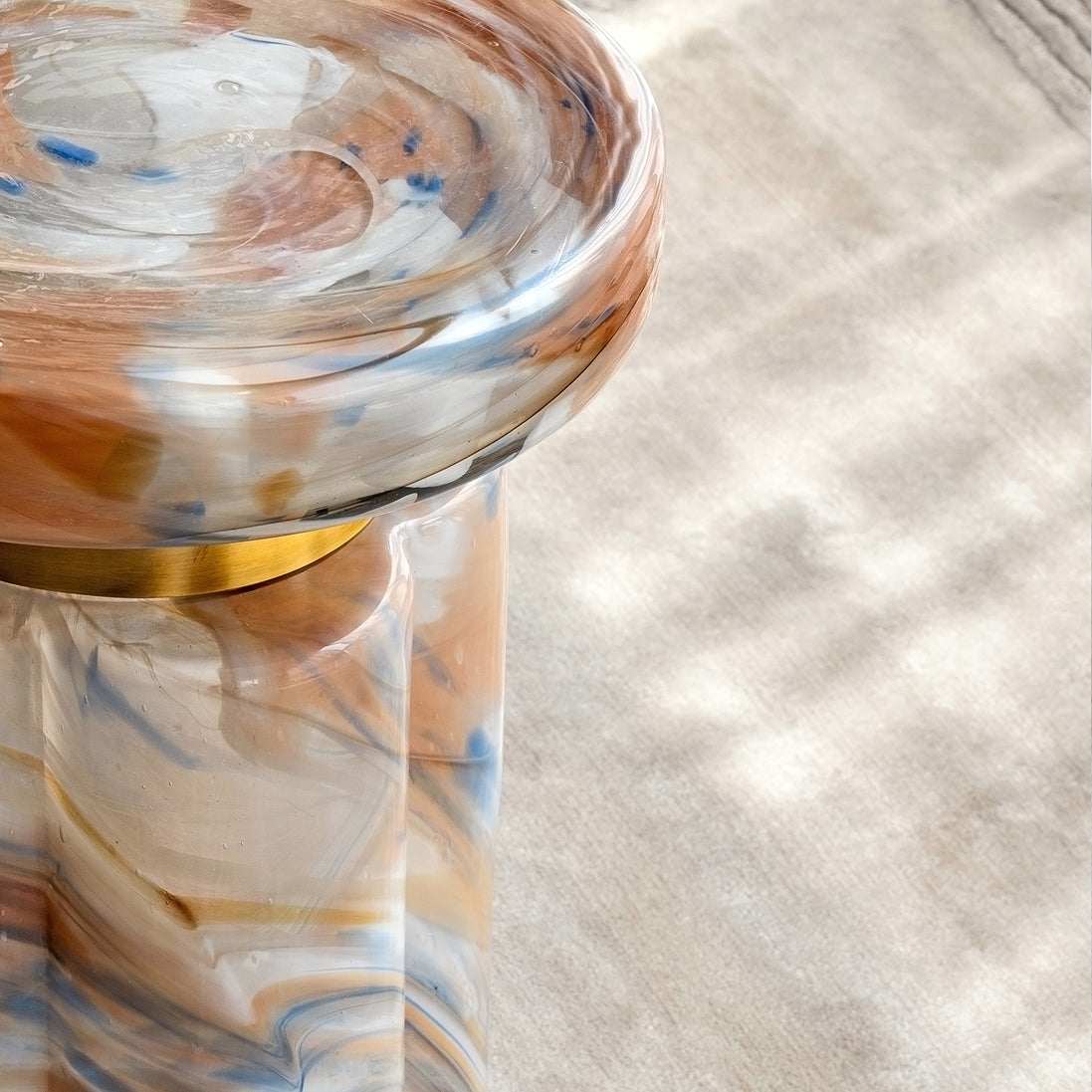 Clover swirl accent table with clover-shaped base and pastel tones, luxury designer side table for modern home décor