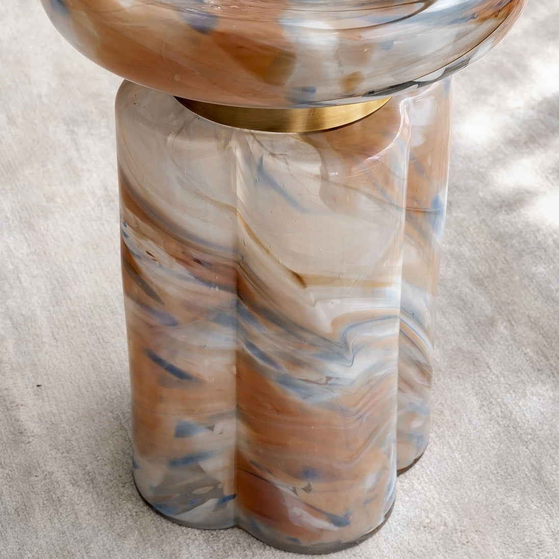 Clover swirl accent table with clover-shaped base and pastel tones, luxury designer side table for modern home décor
