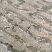Handmade bamboo silk rug with an abstract design in warm beige and cream tones for contemporary and luxury interiors.