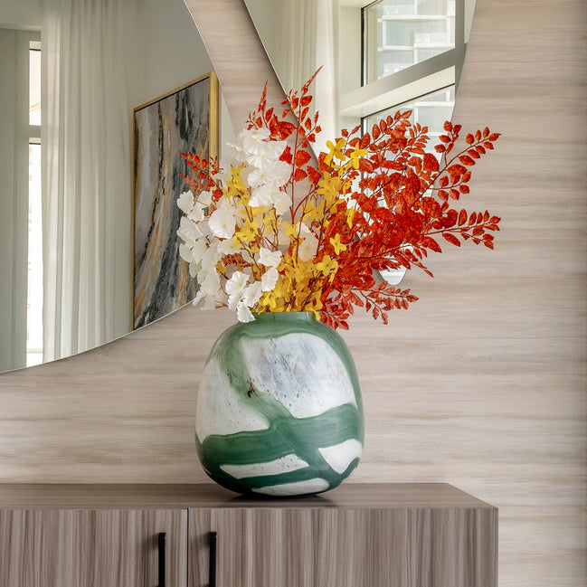 Iris abstract glass vase with rounded shape and green brushstroke pattern on white background, decorative vase for modern home décor
