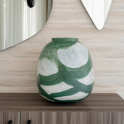 Iris abstract glass vase with rounded shape and green brushstroke pattern on white background, decorative vase for modern home décor