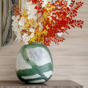 Iris abstract glass vase with rounded shape and green brushstroke pattern on white background, decorative vase for modern home décor