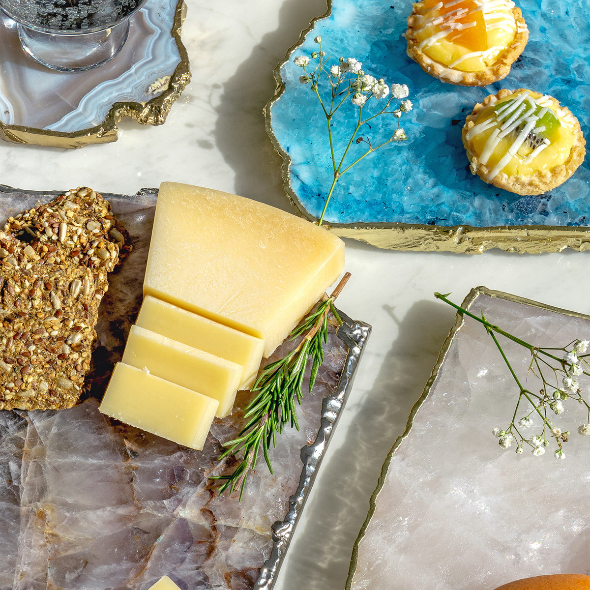 Kristal blue agate stone platter with organic shape and light gold edge, luxury natural stone serving platter for elegant entertaining and décor