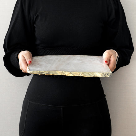 Kristal rose quartz stone platter with organic shape and gold edge, luxury serving platter for elegant home décor and entertaining.