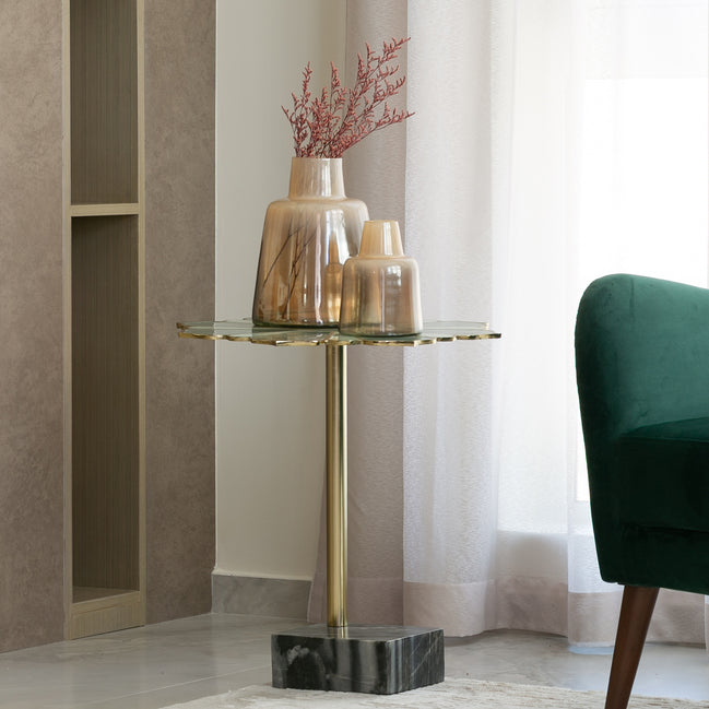 Lotus handcrafted metal side table with enamel finish and grey marble base, sculptural accent table for modern home décor