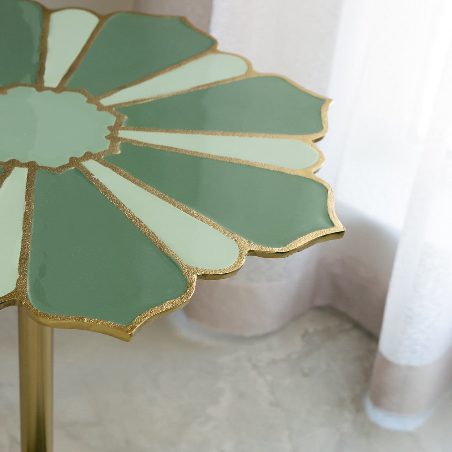 Lotus handcrafted metal side table with enamel finish and grey marble base, sculptural accent table for modern home décor
