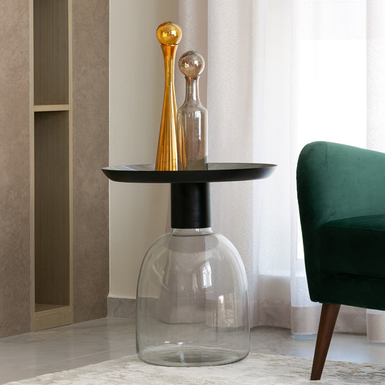 Luxe black and grey glass accent table with handblown glass base and matte black metal finish, modern side table for home décor