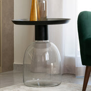 Luxe black and grey glass accent table with handblown glass base and matte black metal finish, modern side table for home décor