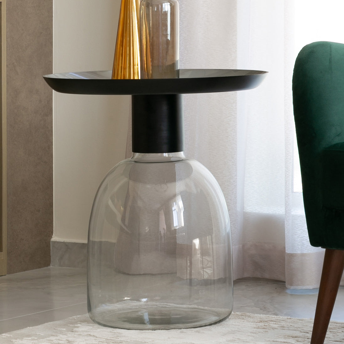 Luxe black and grey glass accent table with handblown glass base and matte black metal finish, modern side table for home décor
