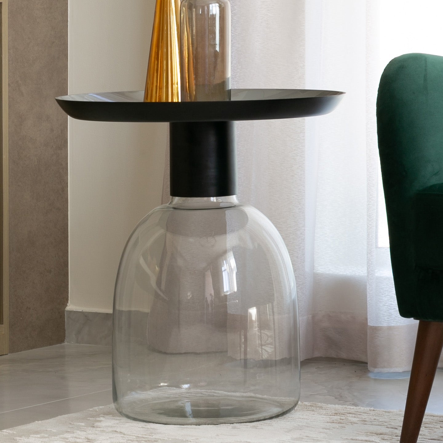 Luxe black and grey glass accent table with handblown glass base and matte black metal finish, modern side table for home décor