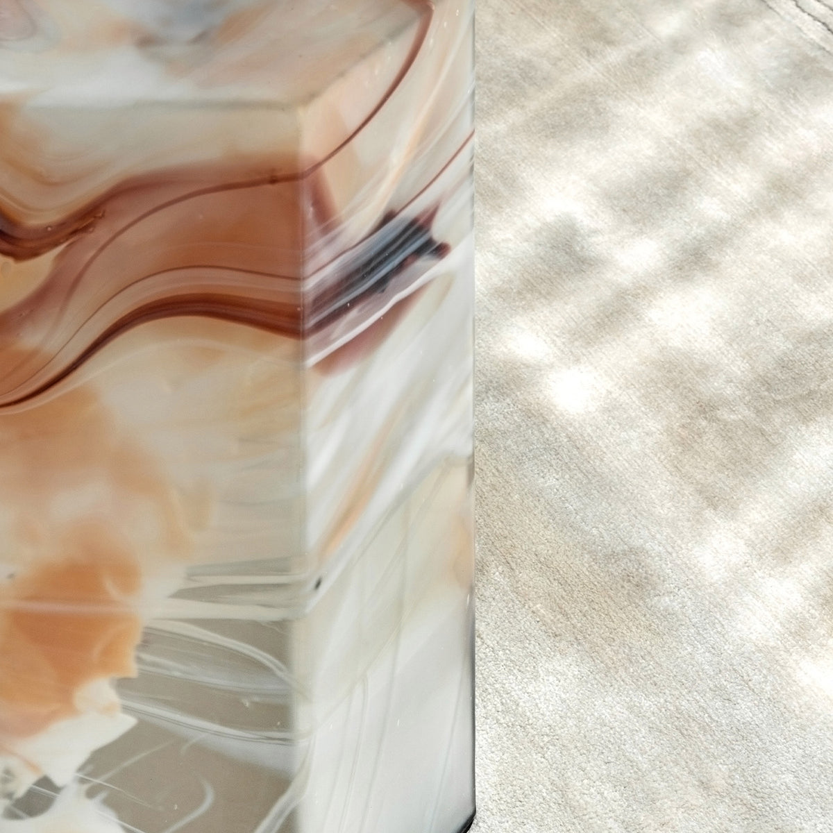 Mist hexagon glass table with handcrafted swirling colour patterns, modern solid glass accent table for luxury home interiors.