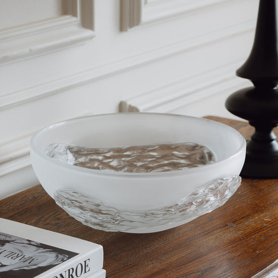 Decorative glass bowl with a frosted white base and textured clear finish inspired by quartz crystal for modern luxury interiors.