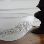 Decorative glass bowl with a frosted white base and textured clear finish inspired by quartz crystal for modern luxury interiors.