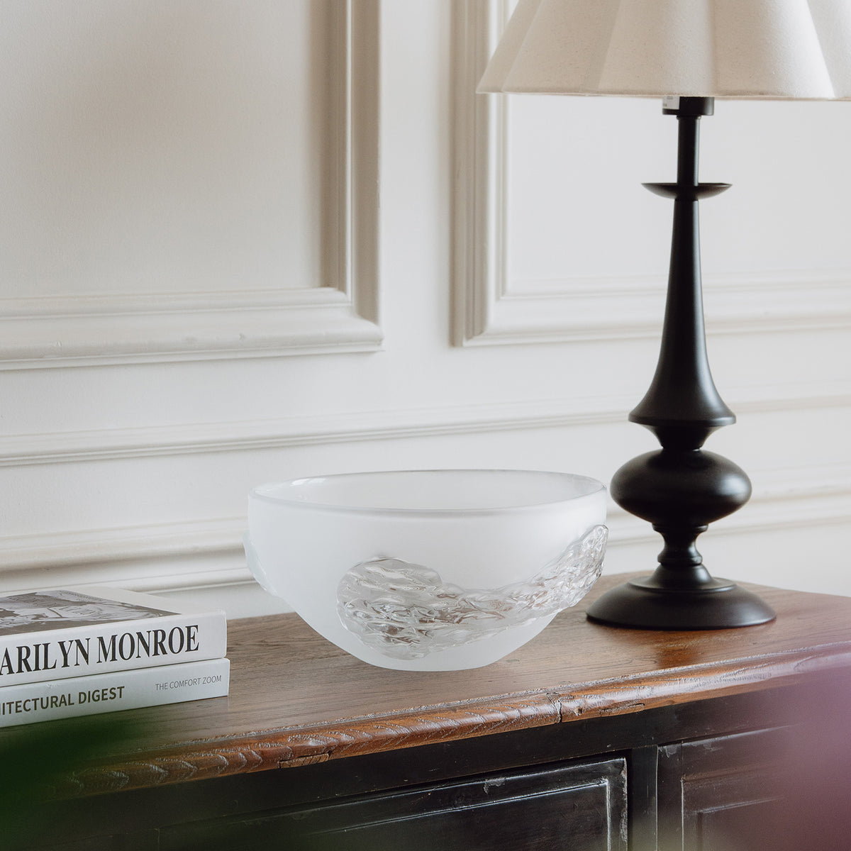 Decorative glass bowl with a frosted white base and textured clear finish inspired by quartz crystal for modern luxury interiors.