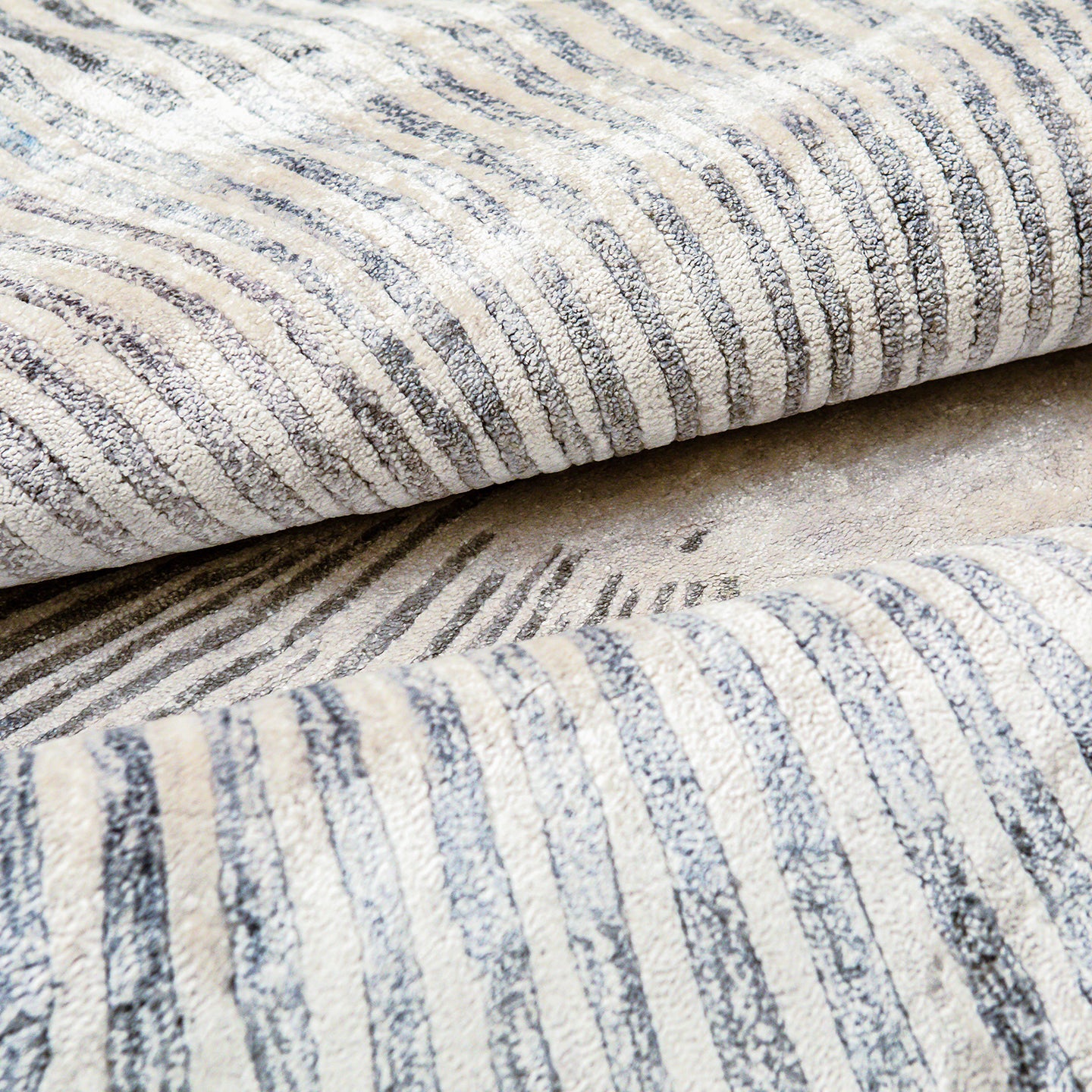 Starburst Blue and Cream Handmade Silk Rug for Modern Living Room or Bedroom Floor.