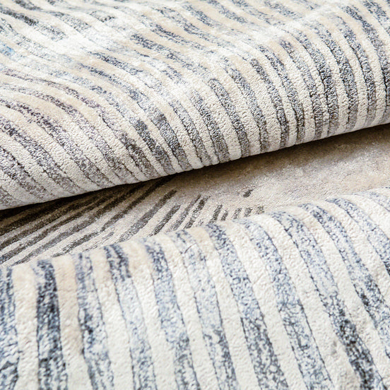 Starburst Blue and Cream Handmade Silk Rug for Modern Living Room or Bedroom Floor.