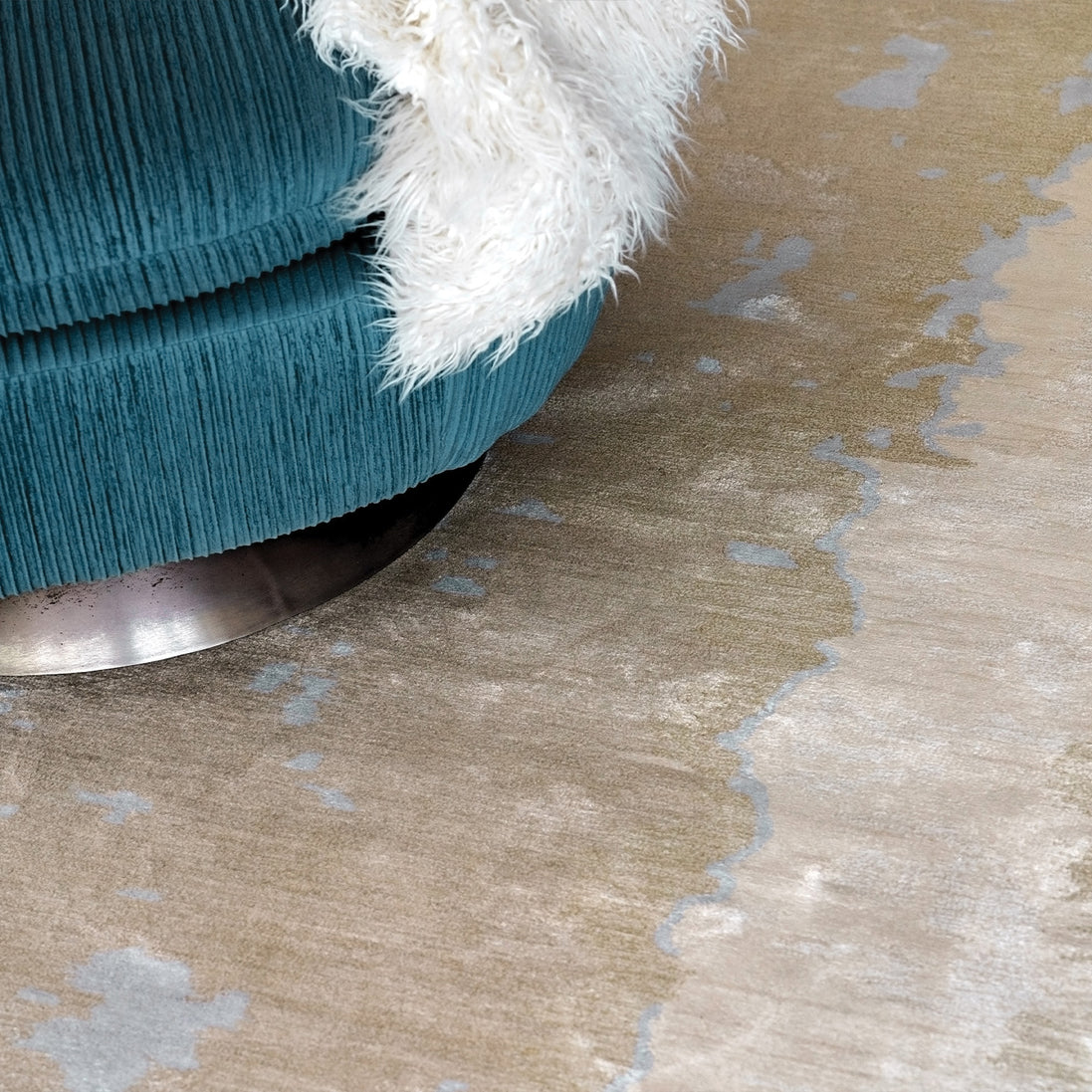 Handmade bamboo silk rug with layered blue tones inspired by the Greek island of Santorini and Mediterranean coastal landscapes.