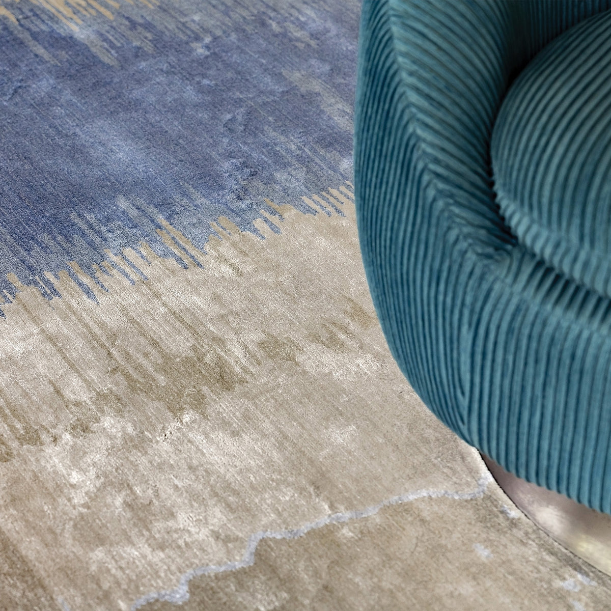 Handmade bamboo silk rug with layered blue tones inspired by the Greek island of Santorini and Mediterranean coastal landscapes.