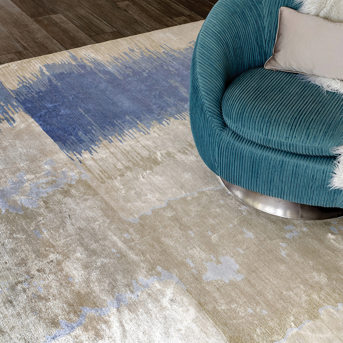 Handmade bamboo silk rug with layered blue tones inspired by the Greek island of Santorini and Mediterranean coastal landscapes.