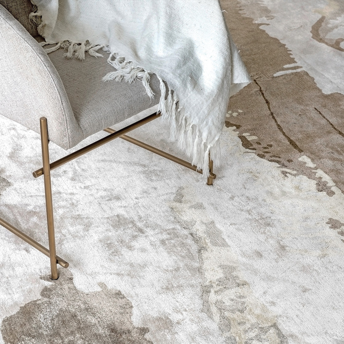Handmade bamboo silk rug with an abstract design in warm neutral tones for contemporary and luxury interiors.