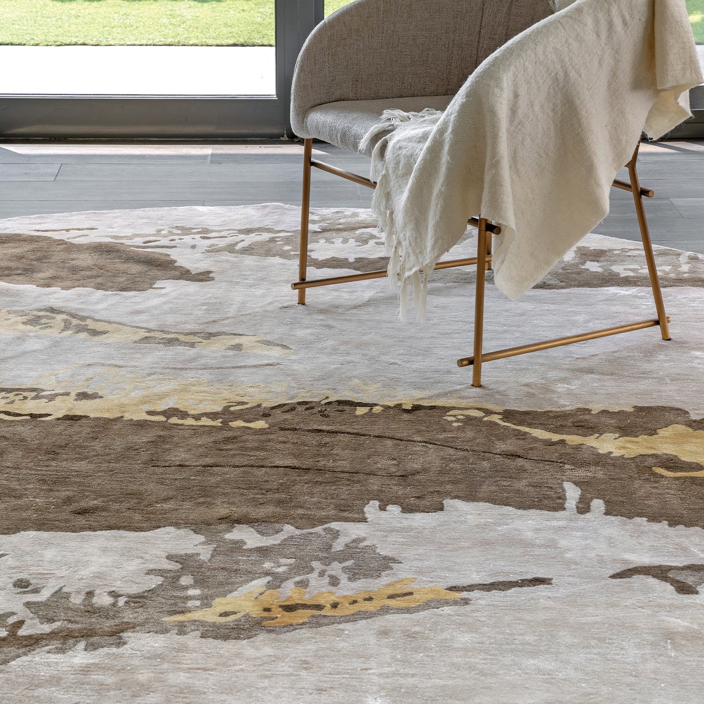 Handmade bamboo silk rug with an abstract design in warm neutral tones for contemporary and luxury interiors.