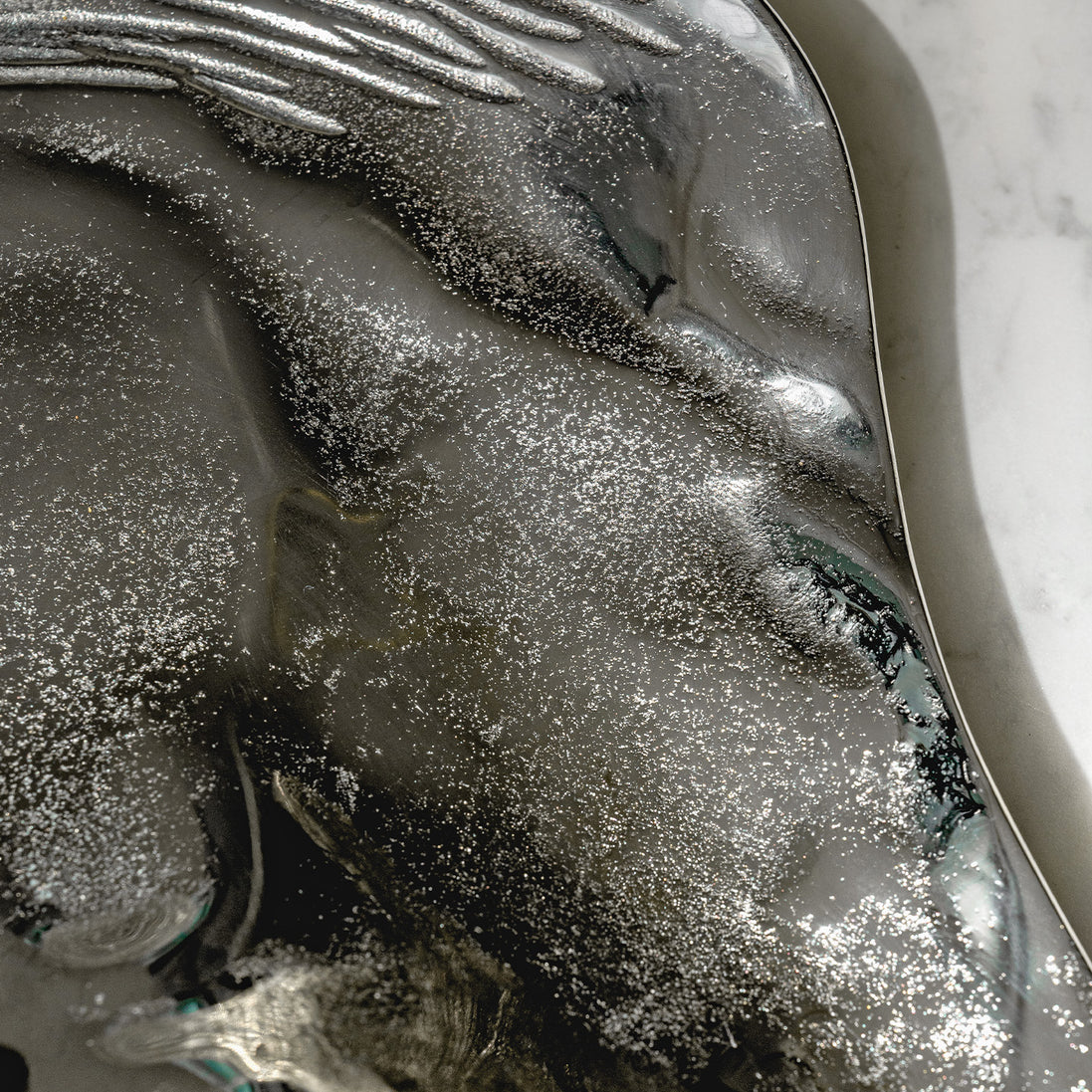 Seashell silver decorative platter with intricate shell design, coastal-inspired luxury home décor accent