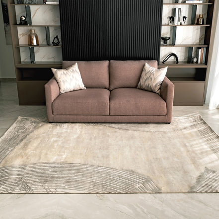 Handmade bamboo silk rug with a subtle organic border inspired by the Japanese Wabi-Sabi aesthetic in soft neutral tones.