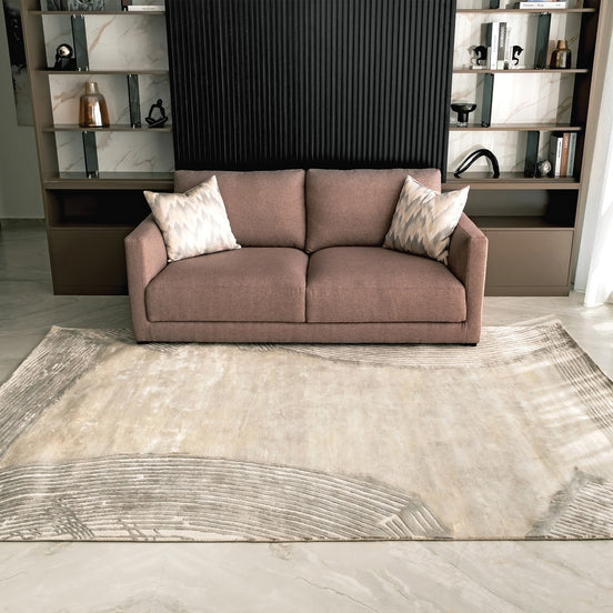 Handmade bamboo silk rug with a subtle organic border inspired by the Japanese Wabi-Sabi aesthetic in soft neutral tones.